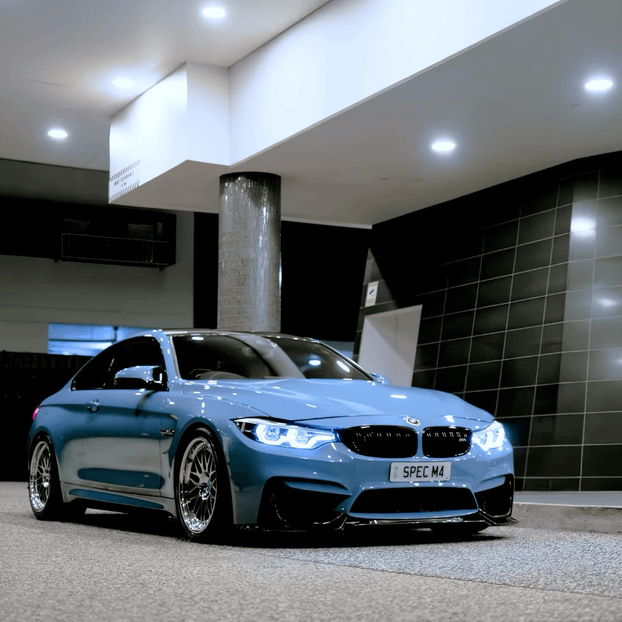 Yas Marina Blue BMW F82 M4 Competition on polished MW-21 Ascari wheels, view 1 of 5